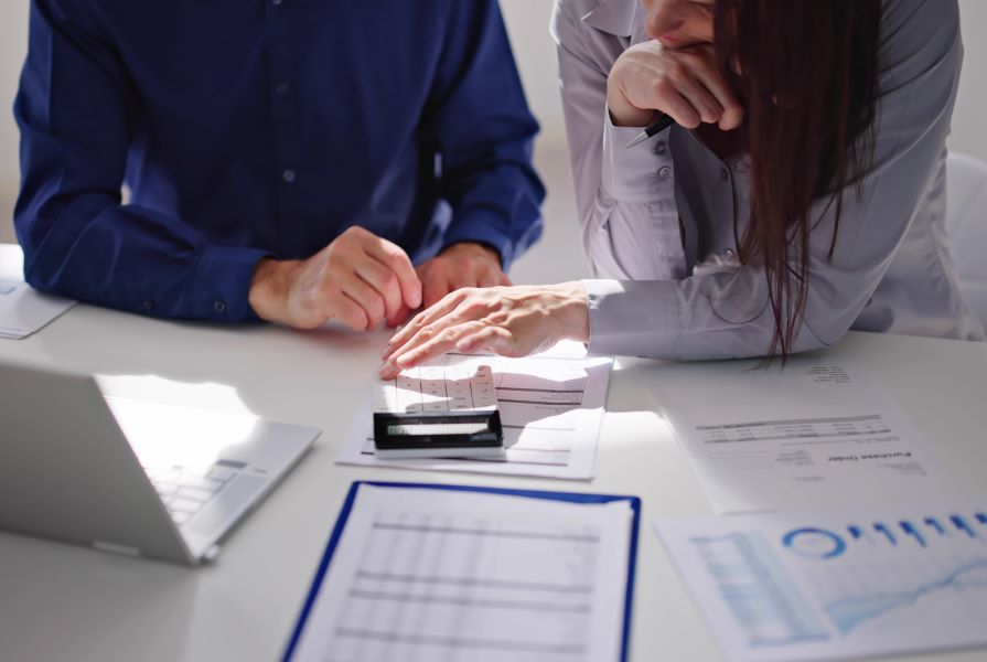 A small business owner meeting with Mischel & Co chartered accountants in Melbourne for expert advice.